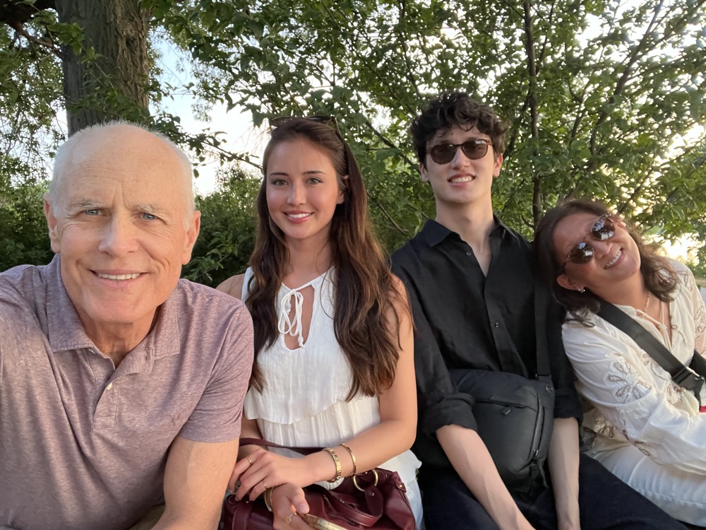 Crick Waters with family outdoors